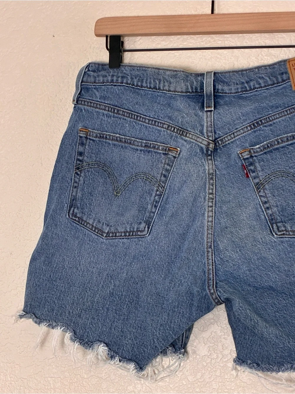 Levi’s | 501 button fly raw hem cut off long jean shorts bermuda denim size 32